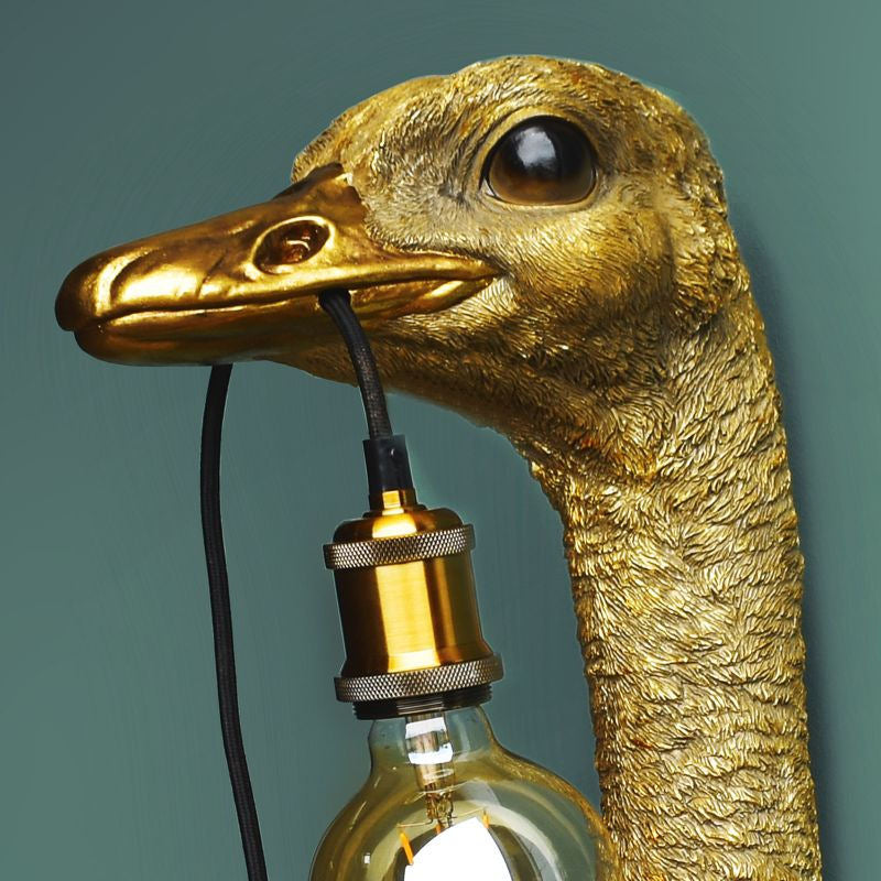Nástěnná designová lampa na zeď pštros Franz Josef, zlatá