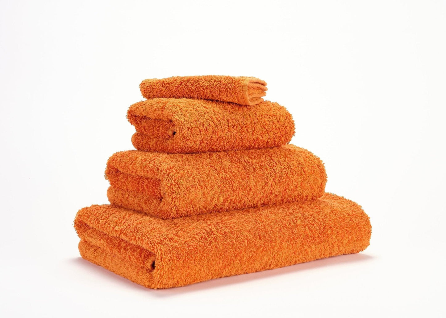 Luxusní ručník z egyptské bavlny v šťavnatém odstínu mandarinky Tangerine Super Pile Abyss & Habidecor Waterfall Bathrooms