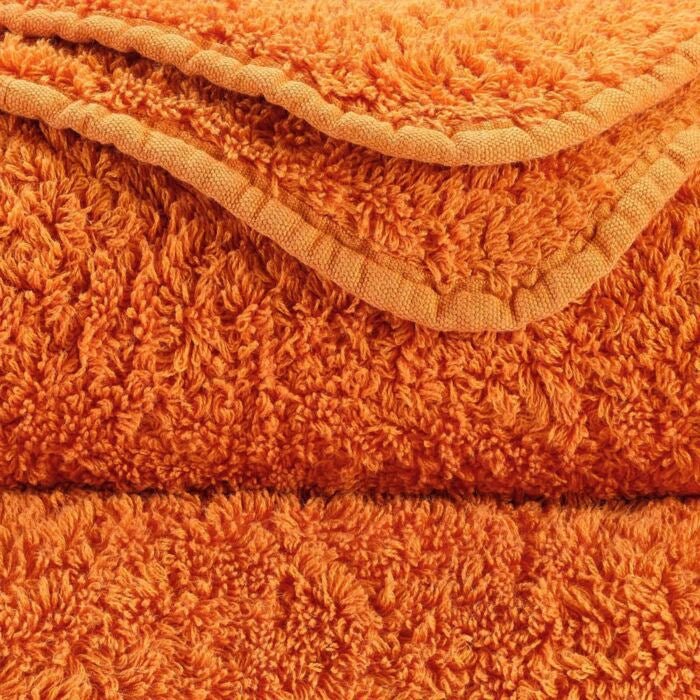 Luxusní ručník z egyptské bavlny v šťavnatém odstínu mandarinky Tangerine Super Pile Abyss & Habidecor Waterfall Bathrooms