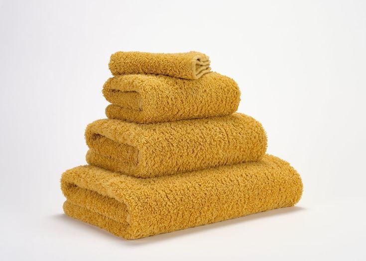 Luxusní ručník z egyptské bavlny v sytém šafránovém odstínu Safran Super Pile Abyss & Habidecor Waterfall Bathrooms